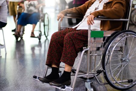 Ederly patient woman at Out Patient Department on wheelchair in hospital