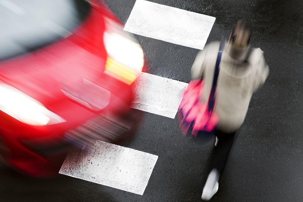 crosswalk of street city with people in dangerous situation